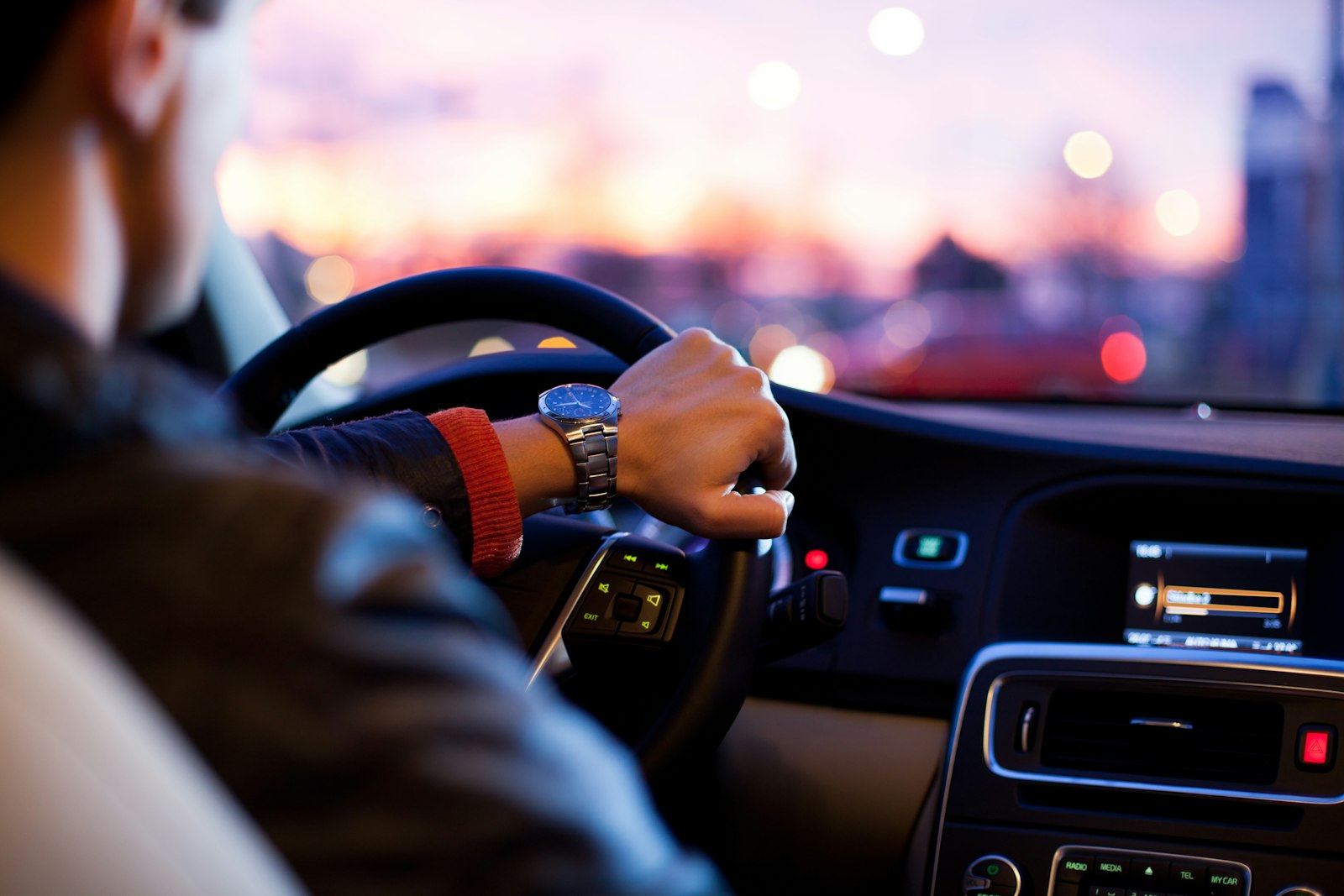 Professional Airport Shuttles driver opening car door